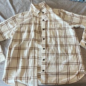 white and brown striped flannel